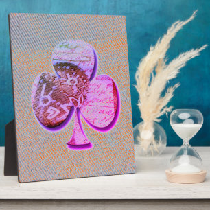 Paarse klaver op oranje en blauw denim fotoplaat