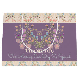 Paarse met bloemige accenten groot cadeauzakje