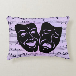 Paarse muziek- en theatermaskers accent kussen