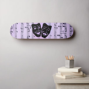 Paarse muziek- en theatermaskers persoonlijk skateboard