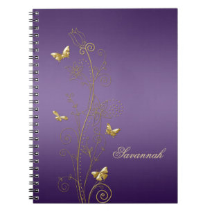 Paarse notebooks met gouden bloemvlinders notitieboek