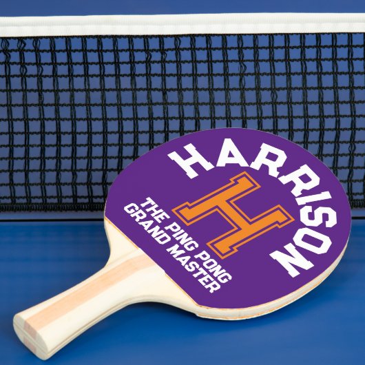 Paarse oranje aangepaste monogram naam en slogan tafeltennisbatje (Insitu)