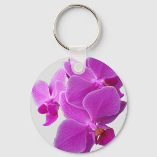 Paarse orchideeën verbranden op een sleutelhanger