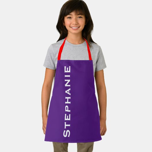 Paarse, rode bandjes, jumbo naam, schort (Insitu)