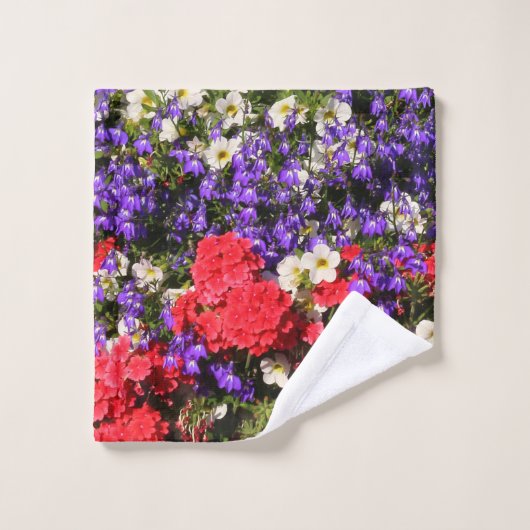 Paarse, rode en witte jaarbloemen bad handdoek (Wasdoekje)