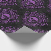 Paarse schedel en gegoten grijs cadeaupapier (Hoek)