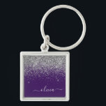 Paarse Silver Glitter Girly Glam Monogram Sleutelhanger<br><div class="desc">Zilveren en Paarse Sparkle Glitter Manuscript monogram Naam Keychains (Sleutelhanger). Dit maakt de perfecte liefhebbende 16 verjaardag,  bruiloft,  vrijgezellenfeest,  verjaardagsdag,  baby shower of vrijgezellenfeest voor iemand die van luxe glam en stijl houdt.</div>
