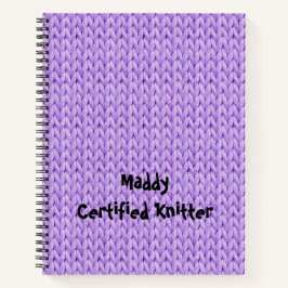 Paarse spiraallaptop van breiwerk notitieboek