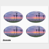 Paarse strand zonsondergang ovale sticker (Vel)