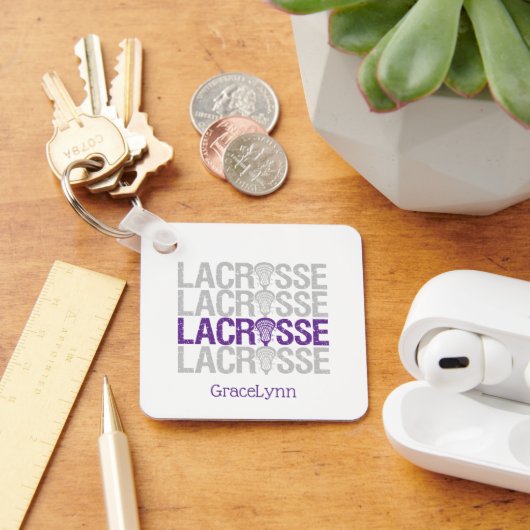 Paarse verweerde lacrosse woord sleutelhanger (Bureau)