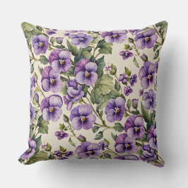 Paarse viooltjes op wit kussen