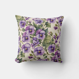 Paarse viooltjes op wit kussen