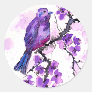Paarse vogel en bloesems ronde sticker