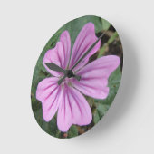 Paarse wandklok met wilde bloem (Hoek)