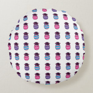 Paaseieren met bloemen en lint rond kussen