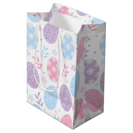 Paaseieren met gemiddeld cadeau medium cadeauzakje