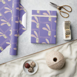 Paashaasjes op paars cadeaupapier