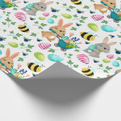 Paaskonijn, eieren en papier voor het verpakken va (Hoek)