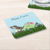 Paaskonijn met een kruiwagen van onderzetters (Schuin)