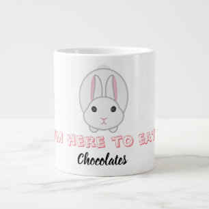 Paaskonijn wacht op chocolade grote koffiekop