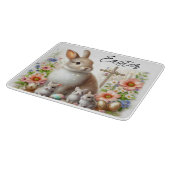 Paaskonijntjes, eieren, bloemen en een kruis snijplank (Hoek)