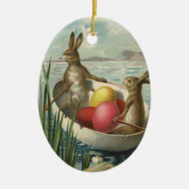  paaskonijntjes in een boot met paaseieren keramisch ornament