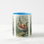  paaskonijntjes in een boot met paaseieren mok (Midden)