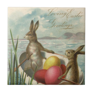paaskonijntjes in een boot met paaseieren tegeltje