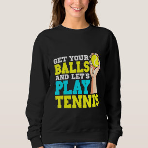 Pak je ballen en laat je tennissen trui