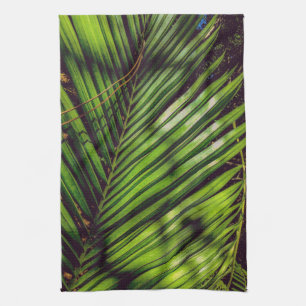Palm Frond, pijnnaalden en handdoeken