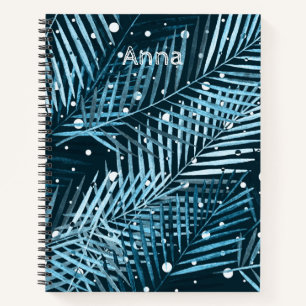 Palmbladeren op blauw met witte poka-stippen. notitieboek