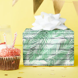 Palmbladeren op een gestreepte zwart-witte achterg cadeaupapier