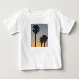 Palmbomen bij zonsondergang
