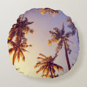 palmbomen blauwe lucht rond kussen