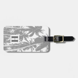 Palmbomen in een geposteriseerd ontwerp bagagelabel