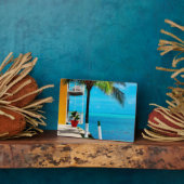 Palmboom aan de voorkant van een huis door het Zee Fotoplaat (Zijkant)