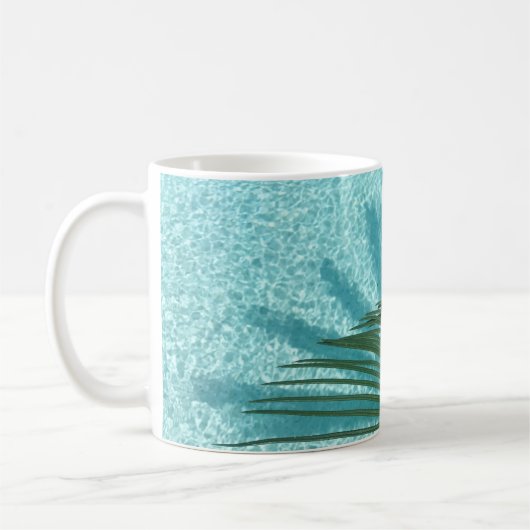 palmboom boven het water koffiemok (Links)