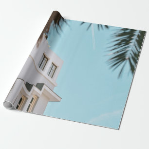 Palmboom nabij wit betongebouw cadeaupapier
