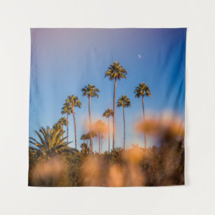 Palmboom onder blauwe hemel wandkleed
