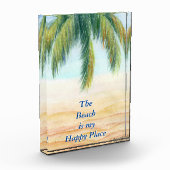 Palmboom op een zonnige dag op het strand fotoblokken (Links)