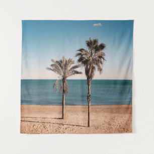 Palmboom op het strand in de ochtend wandkleed