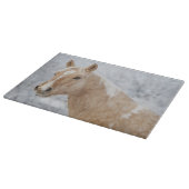 Palminpaarden in de sneeuw snijplank (Hoek)