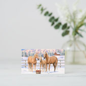 Palomino kwartspaarden in wintersneeuw visitekaartje (Staand voorkant)