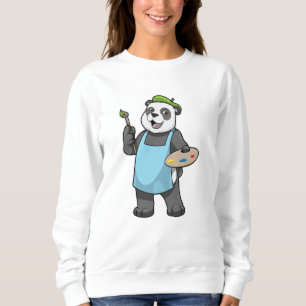 Panda als schilder met penseel en kleur trui