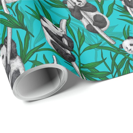 Panda cubs over turkooizen cadeaupapier (Rol Hoek)