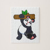 Panda met hout op sterktetraining legpuzzel (Verticaal)