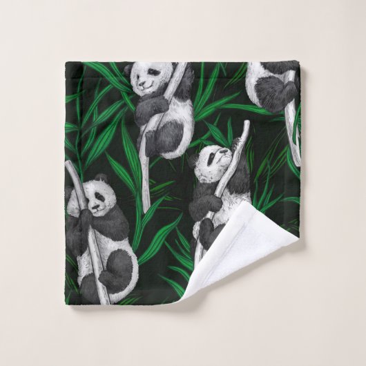 Panduiken op donkergroen bad handdoek (Wasdoekje)