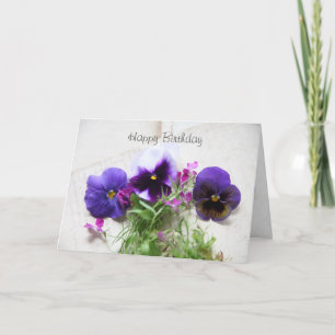 Pansies en lobelia op oud handschrift kaart
