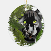 Panter in de afvoer. keramisch ornament (Links)