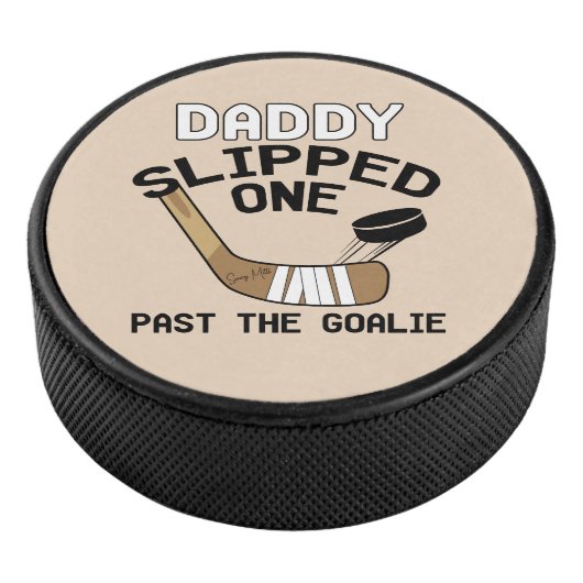 Papa heeft er één uit gehaald. hockey puck (3/4)